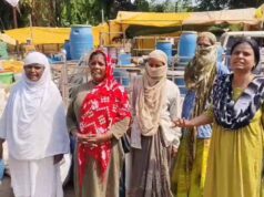 अवैध निर्माण पर चला बुलडोजर, 7 दुकानें ढहाईं; कार्रवाई के दौरान बुलडोजर के आगे लेटी महिला